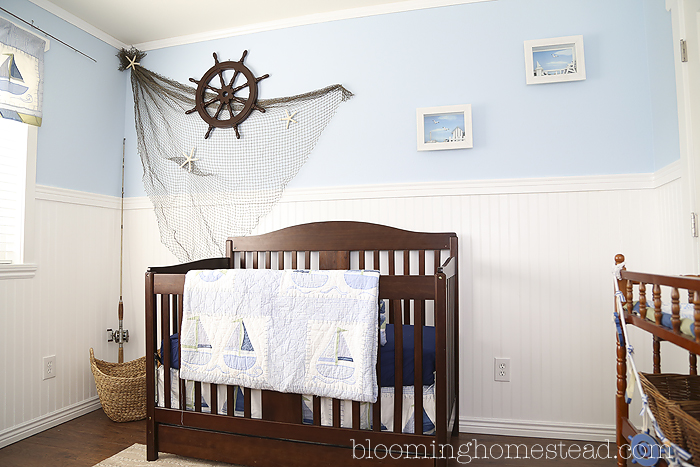 This adorable Nautical Nursery is so sweet. Ships and vintage fishing poles add such a fun addition.