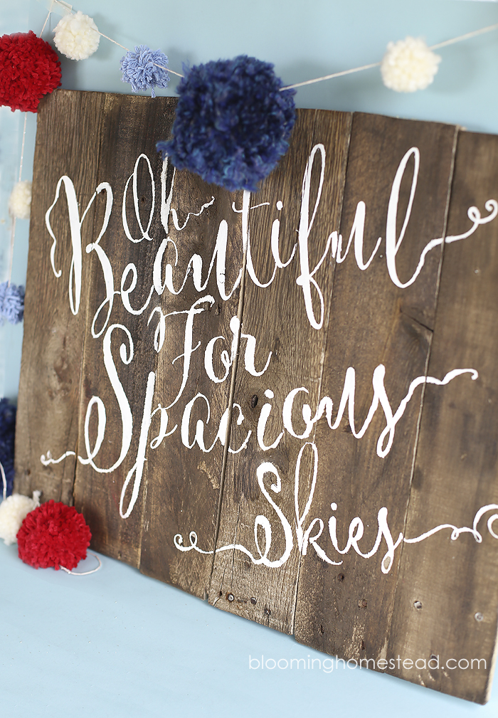 Check out this tutorial showing how to make this gorgeous patriotic calligraphy pallet sign.