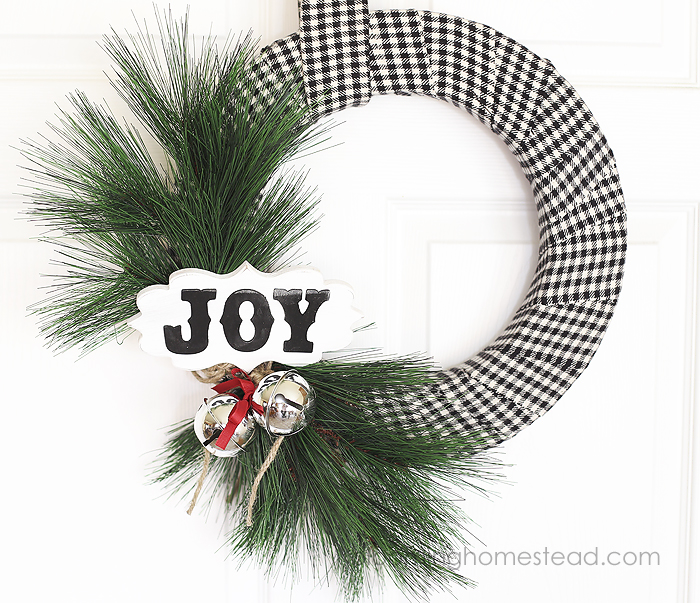 This diy Christmas Wreath is so pretty and is so easy to make. You can watch the video tutorial to learn how to make your own for the holidays!