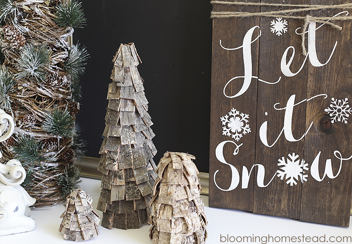 Beautiful DIY Rustic Christmas trees using birch bark. These are so easy and affordable to make and they look great too. Perfect for the holidays, winter, and would even be lovely all year long.