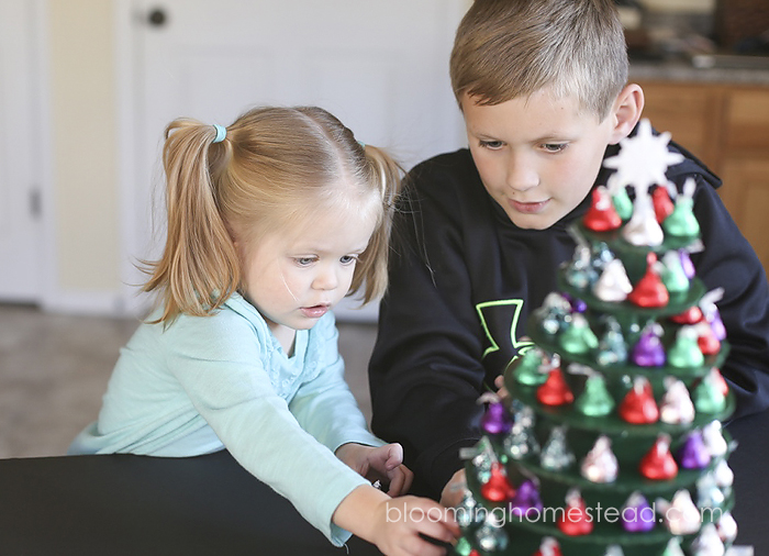 Service "KISS"MAS tree using Hershey kisses. A new fun tradition teaching kids about service during the holidays. Click to learn more!