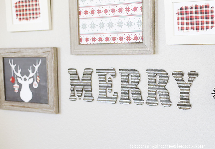 Creating a gallery wall is so simple and I loved using these fun printable holiday art prints I ordered from shutterfly. Get the free printables at www.bloominghomestead.com