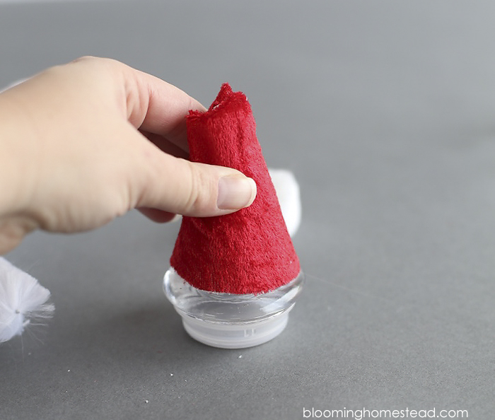 These Santa Hat Jars are so adorable, be sure to fill them with Hershey's Kisses Santa Hat Chocolates you can find at target. Such a fun gift idea or party favor.