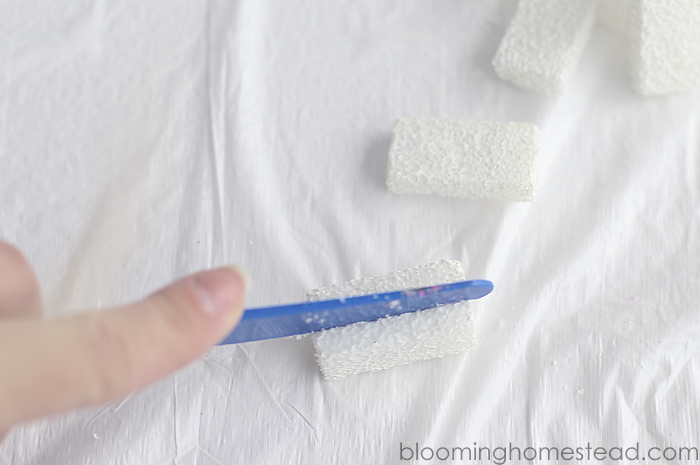 Easy DIY Modern brick vase made out of foam blocks and paper mache! Super easy and adorable craft and lovely home decor.