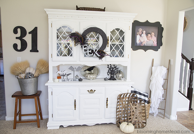 Beautiful black and white Halloween Home Tour with tons of beautiful and elegant halloween decor ideas