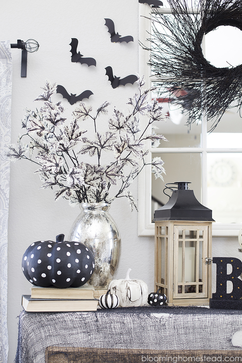 Beautiful black and white Halloween Home Tour with tons of beautiful and elegant halloween decor ideas