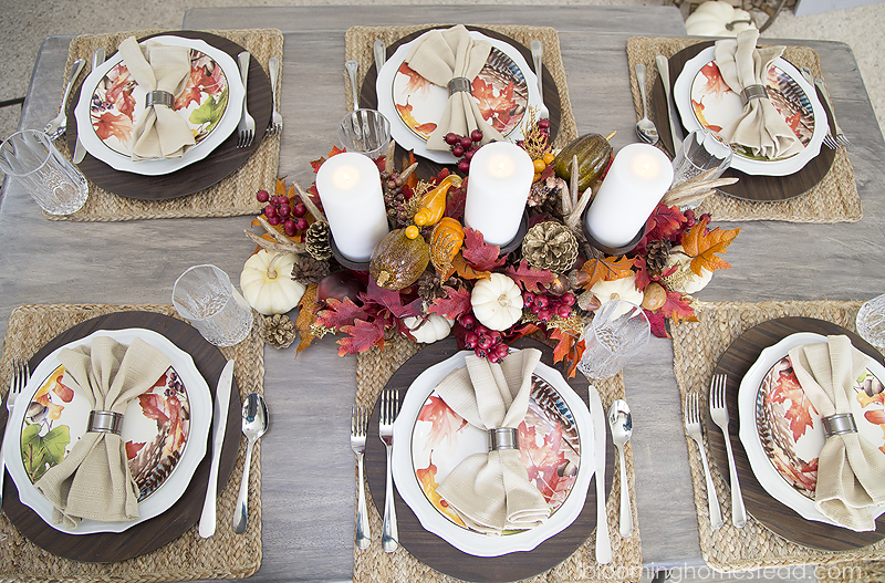 Beautiful Fall Tablescape with festive place settings and lovely fall centerpiece