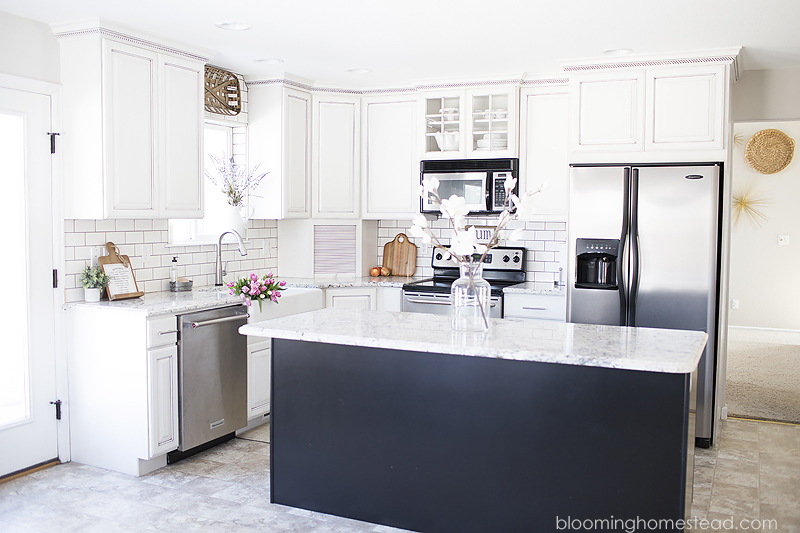 Beautiful Farmhouse Style Kitchen Makeover at Blooming Homestead. Check out the before photos!